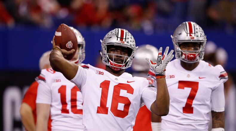 INDIANAPOLIS, IN - DECEMBER 02:  Quarterback J.T. Barrett #16 of the Ohio State Buckeyes looks to pass while warming up before taking on the Wisconsin Badgers in the Big Ten Championship game at Lucas Oil Stadium on December 2, 2017 in Indianapolis, Indiana.  (Photo by Joe Robbins/Getty Images)