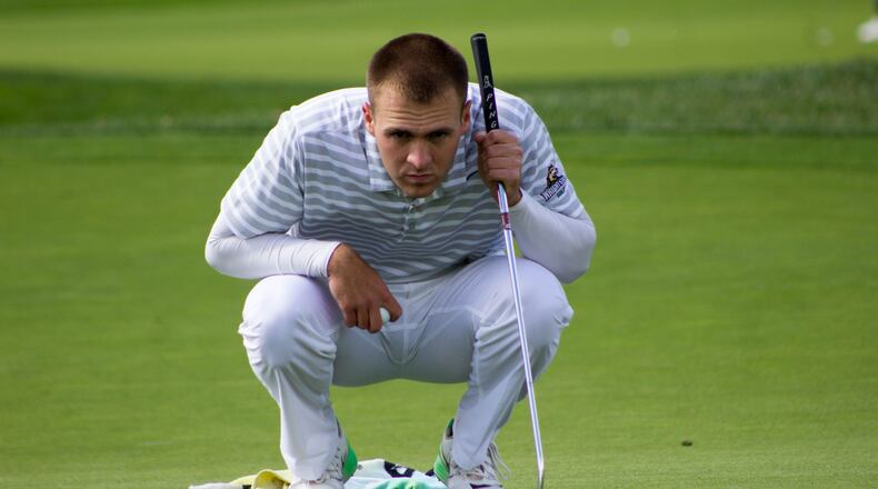 Bryce Haney lines up a putt during a tournament earlier this season. Haney recently was named Horizon League Freshman of the Year. Allison Rodriguez/CONTRIBUTED