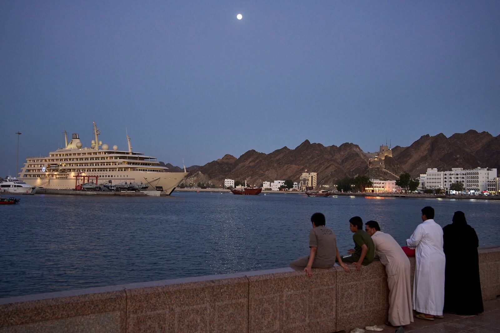 People walk through Mutrah Souq in Muscat, Oman, Friday, April 11, 2025. (AP Photo/ Fatima Shbair)