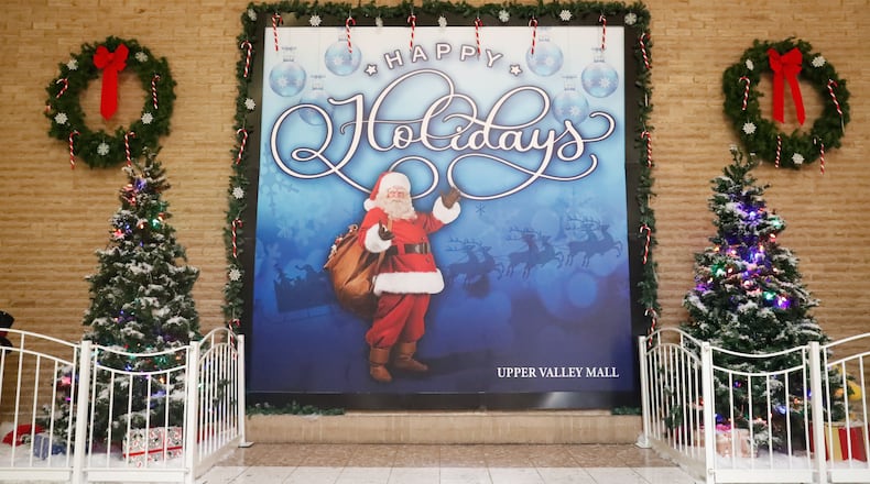 Due to the COVID-19 pandemic, photos with Santa Claus will not be available for purchase at the Upper Valley Mall this year. Instead, residents will be able to come to the Mall to get a free selfie at the Santa Selfie Wall, located behind the Christmas Tree. Contributed