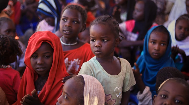 This photo released by The Norwegian Refugee Council (NRC), shows displaced children from el-Fasher at a camp where they sought refuge from fighting between government forces and the RSF, in Tawila, Darfur region, Sudan, Monday, Nov. 3, 2025. (NRC via AP)