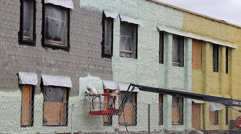 Work continues on the new Greenon School Monday. BILL LACKEY/STAFF