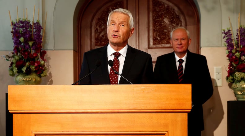 FILE - Chairman of the Norwegian Nobel Committee Thorbjorn Jagland announces the winner of the Nobel Peace Prize, at the Nobel Institute in Oslo, Friday Oct. 11, 2013. (Heiko Junge/NTB Scanpix via AP, File)