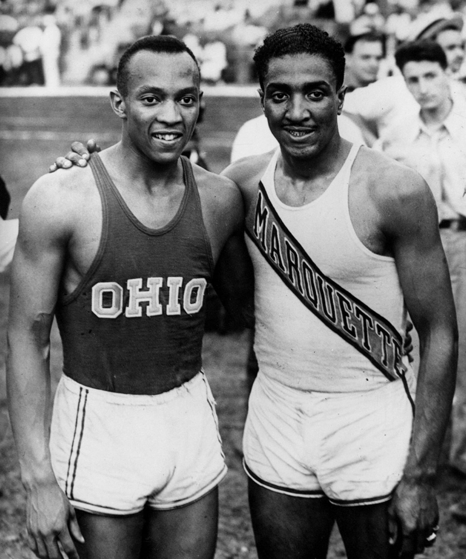 Former Ohio State track & field superstar Jesse Owens (1913 -1980), on the left, won four gold medals at the 1936 Olympics in Berlin. He's pictured here with fellow competitor Ralph Metcalfe (1910-1978). CONTRIBUTED PHOTO
