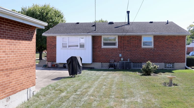 Next to the patio in the backyard is a gas grill; there is also a fenced garden. The property also has a sprinkler system. Contributed photos by Kathy Tyler