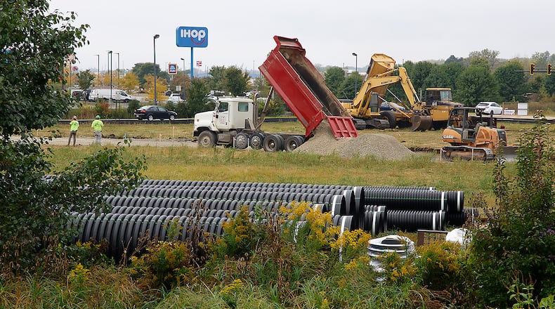 The site is being prepped for a new hotel at the intersection of Bechtle Avenue and St. Paris Pike Thursday, Sept. 28, 2023. BILL LACKEY/STAFF