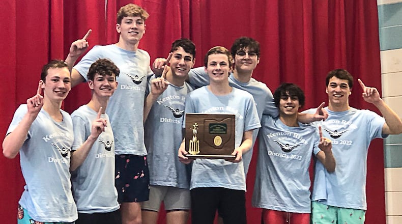 The Kenton Ridge High School boys swimming team poses with the trophy after winning the school's first-ever Division II district title on Friday, Feb. 18 at the Miami University Aquatic Center. CONTRIBUTED PHOTO