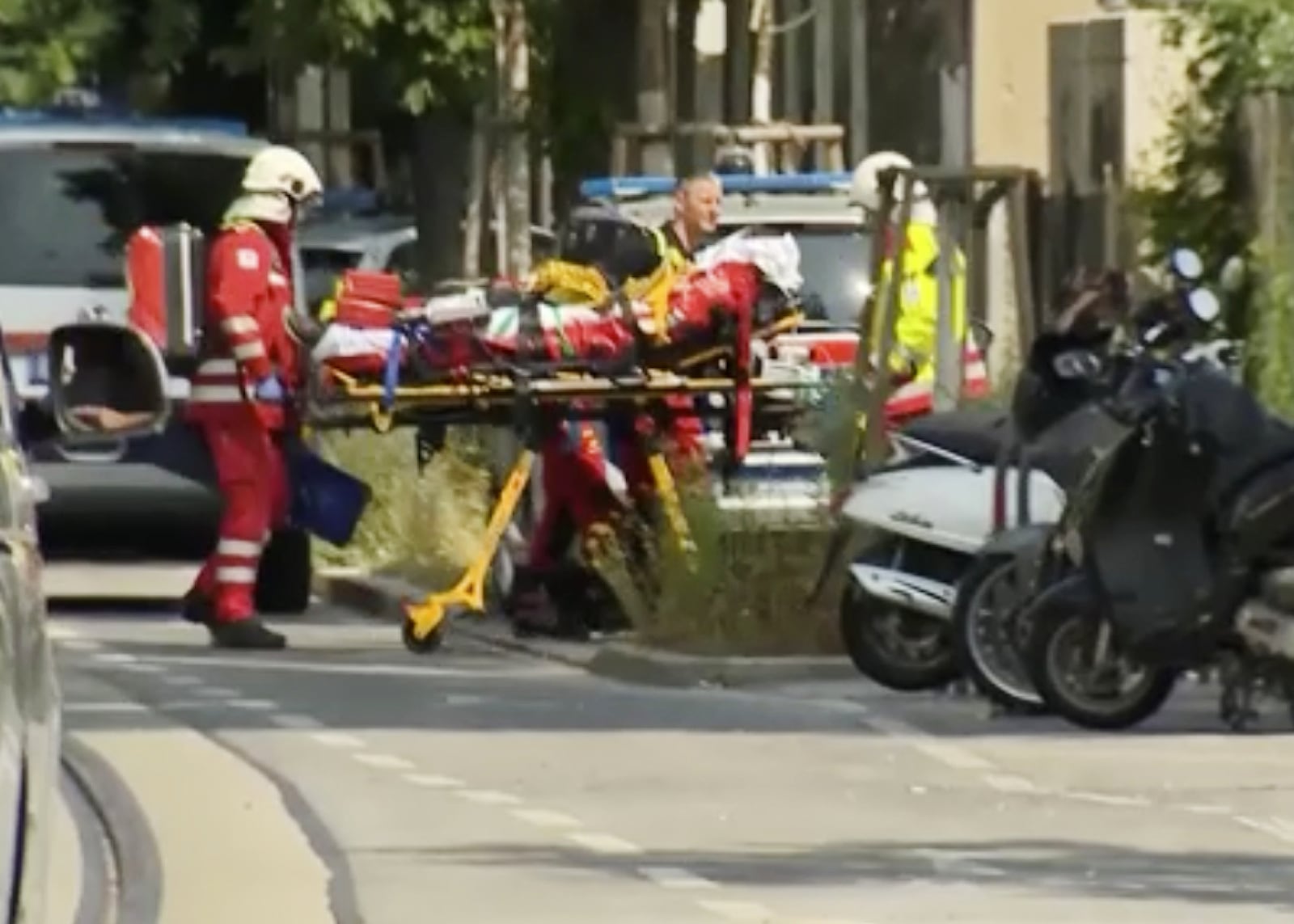 In this image made from video provided by Servus TV, police at the scene of a shooting at a school in Graz, Austria, Tuesday, June 10, 2025. (Servus TV via AP)