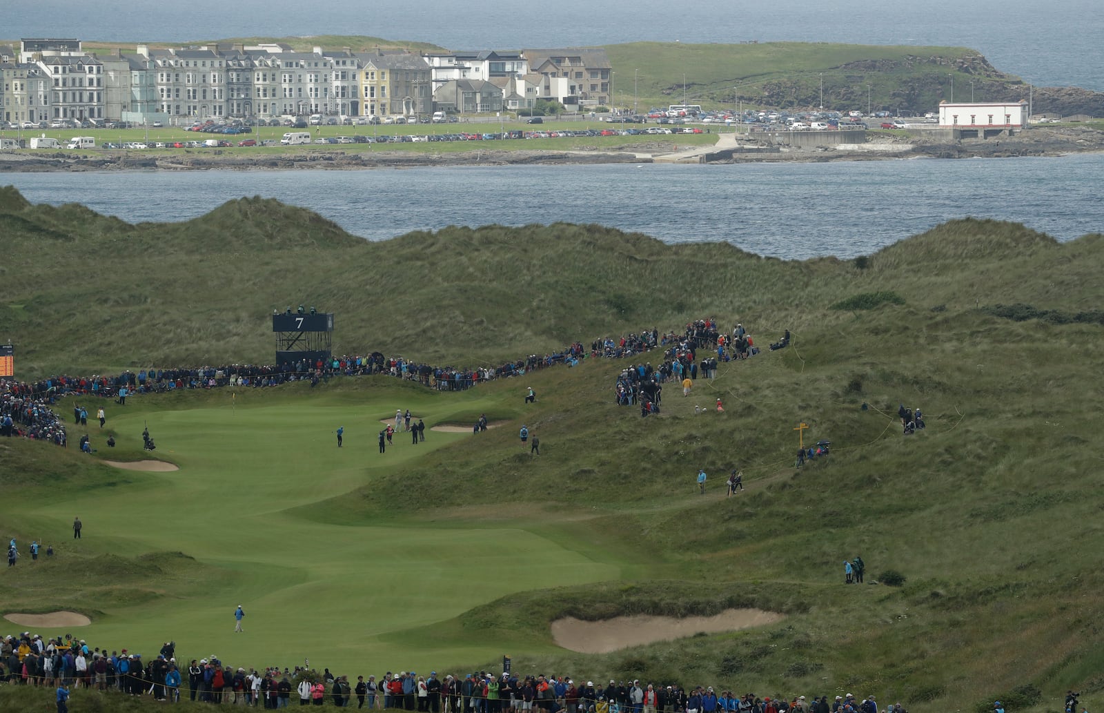 FILE - Northern Ireland's Rory McIlroy plays his approach shot to the 7th green during the first round of the British Open Golf Championships at Royal Portrush in Northern Ireland, July 18, 2019. (AP Photo/Matt Dunham, File)