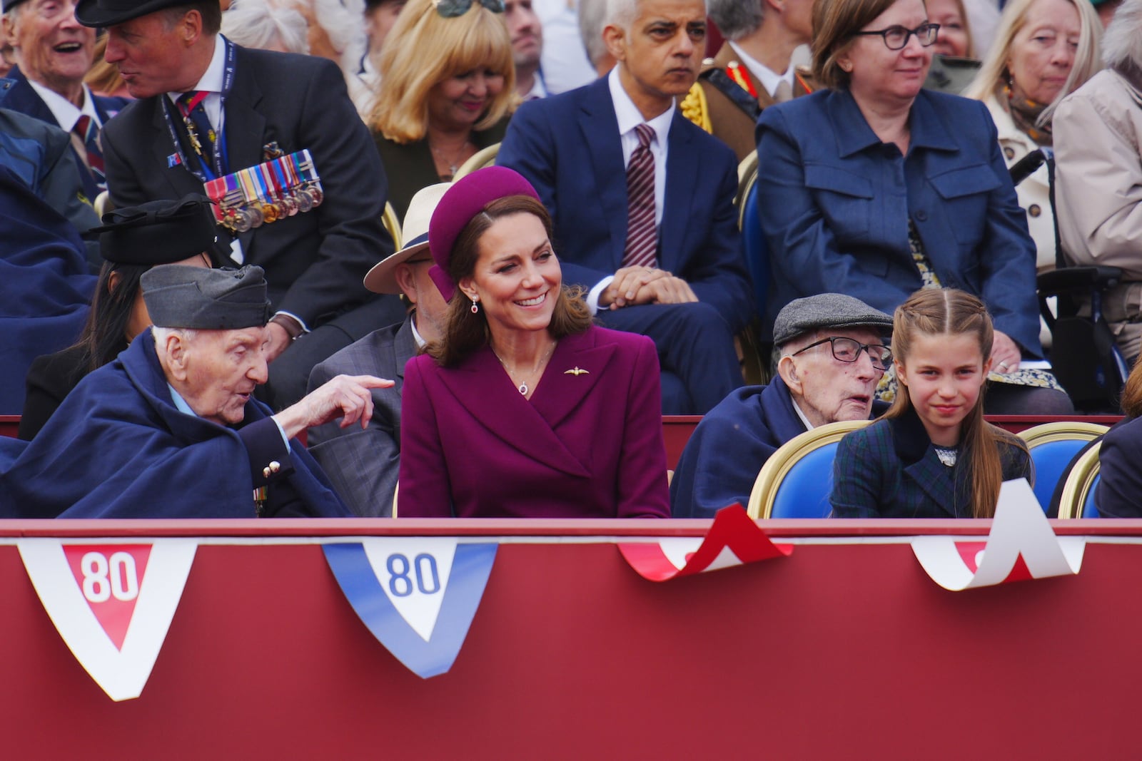 From left, veteran Bernard Morgan, Britain's Kate, Princess of Wales and Princess Charlotte attend the military procession marking the 80th anniversary of VE Day, in London, Monday, May 5, 2025. (Ben Birchall/Pool Photo via AP)