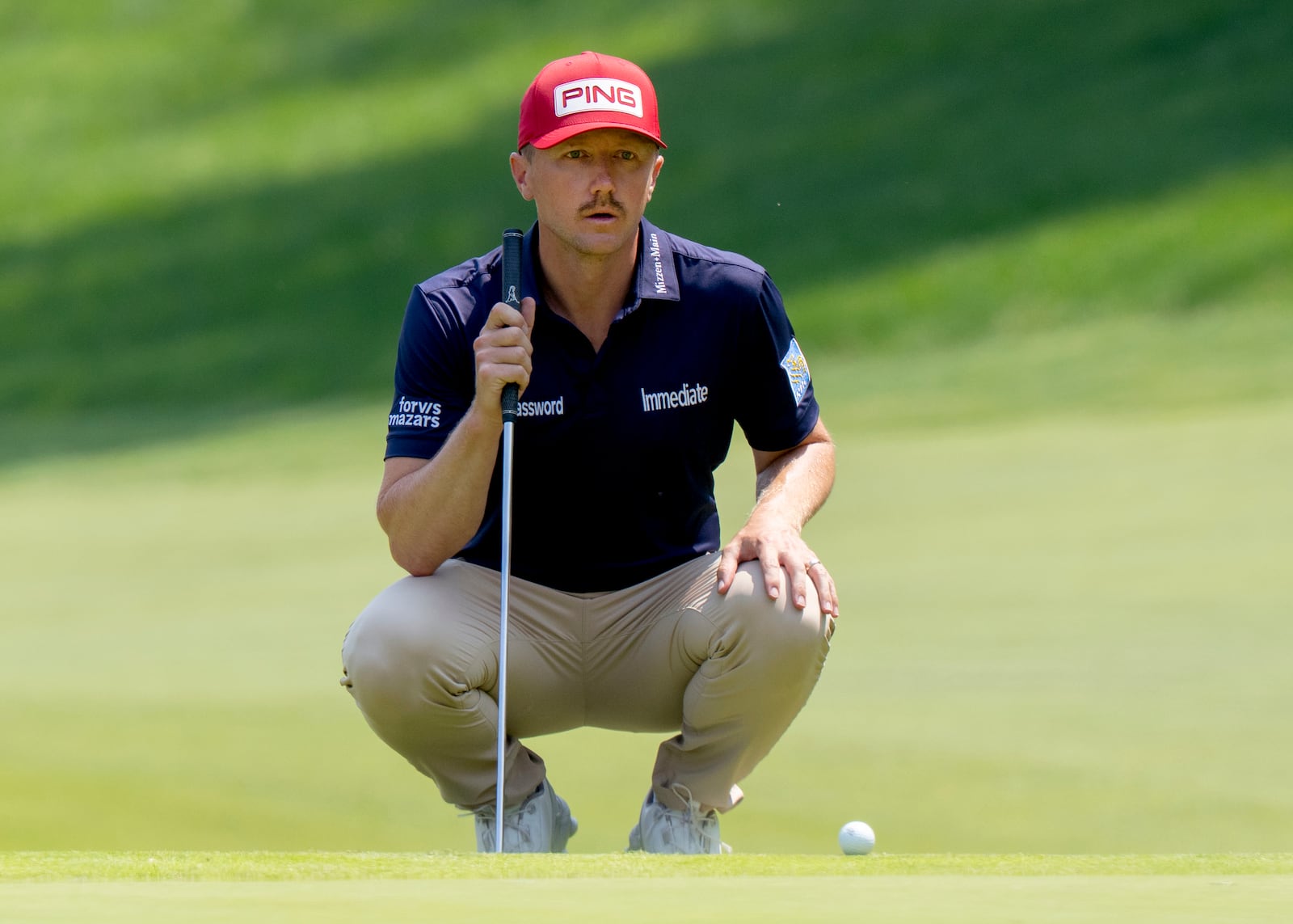 Canada's Mackenzie Hughes lines up his putt on the 10th hole during the third round of the Canadian Open golf tournament in Caledon, Ontario, Saturday, June 7, 2025. (Frank Gunn/The Canadian Press via AP)