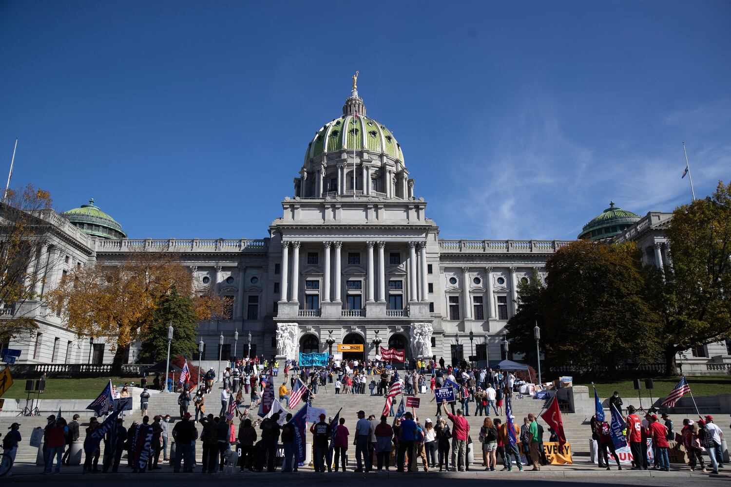 Supporters of President Donald Trump rally outside the Pennsylvania State Capitol in Harrisburg, Pa., on Saturday, Nov. 7, 2020, after it was announced that Joe Biden was elected the 46th president of the United States. President-elect Biden achieved victory offering a message of healing and unity. He will return to Washington facing a daunting set of crises. (Victor J. Blue/The New York Times)