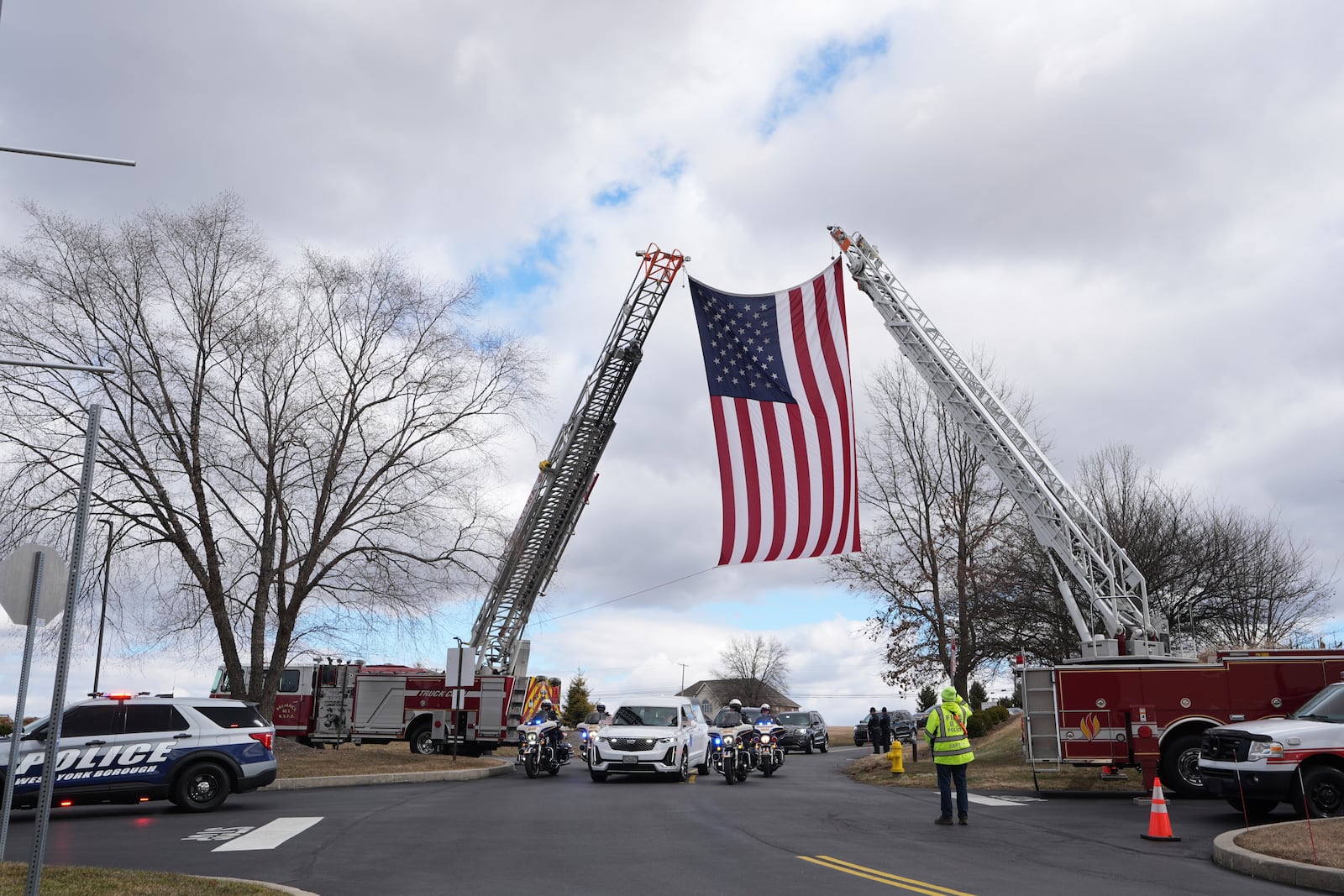 FILE - The remains of West York Borough Police Officer Andrew Duarte, arrive for his funeral at Living Word Community Church, in Red Lion, Pa., Feb. 28, 2025. (AP Photo/Matt Rourke, File)