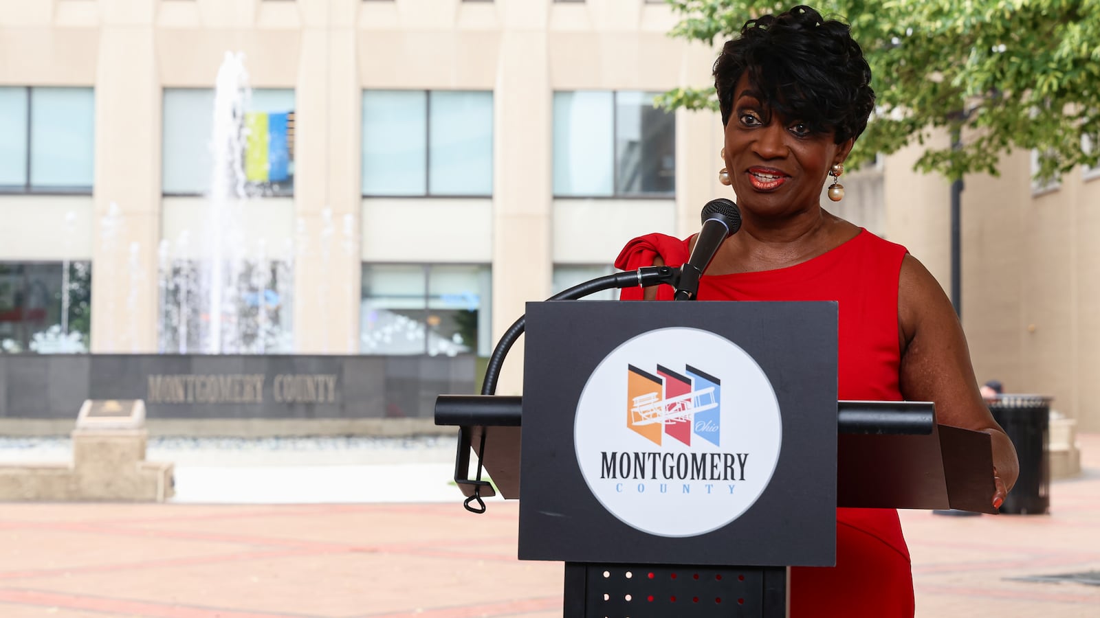 Montgomery County Commissioner Mary McDonald speaks during a ribbon cutting ceremony for the recently reconstructed fountain in Courthouse Square in downtown Dayton on Friday. The project, which included renovations on the area surrounding the fountain, were completed for $1.1 million. BRYANT BILLING / STAFF