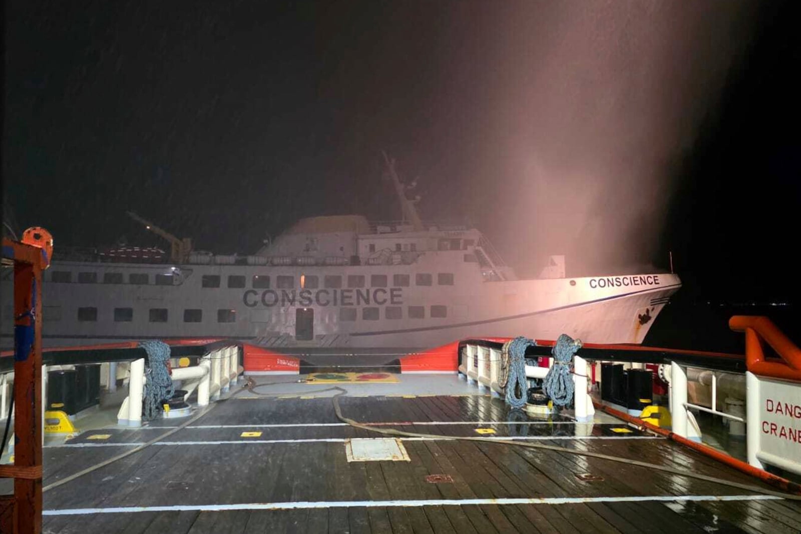 This photo provided by the Goverment of Cyprus and taken from the EDT ship AEOLUS shows The Conscience, after a drone struck the vessel carrying aid to Gaza off the coast of Malta, Friday, May 2, 2025. (Government of Cyprus via AP)