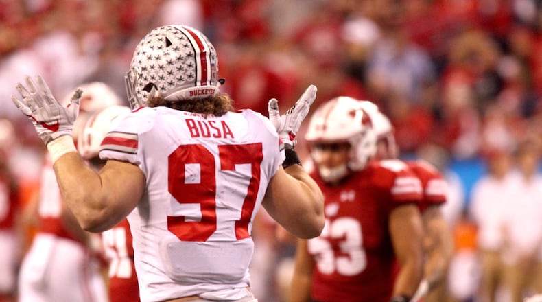 Ohio State’s Nick Bosa celebrates a tackle against Wisconsin on Dec. 2, 2017, at Lucas Oil Stadium in Indianapolis. David Jablonski/Staff