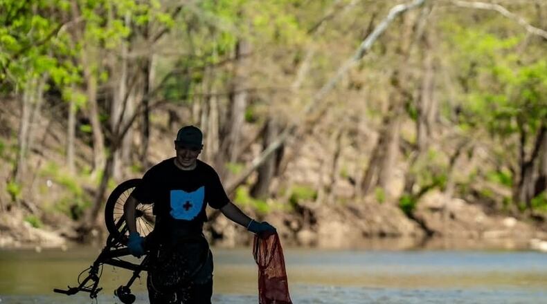 A group of volunteers working with Water Safe Ohio, including kayakers from across the state, performed a cleanup of Buck Creek in Springfield on Sunday, April 27. Photos courtesy Steve Miller @ Marked Imagery