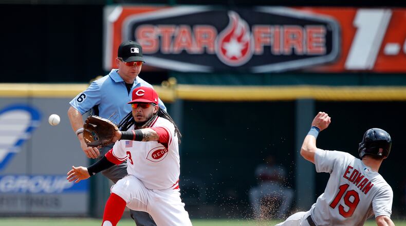 CINCINNATI, OH - AUGUST 18: Tommy Edman #19 of the St. Louis Cardinals steals second base ahead of the throw to Freddy Galvis #3 of the Cincinnati Reds in the first inning at Great American Ball Park on August 18, 2019 in Cincinnati, Ohio. (Photo by Joe Robbins/Getty Images)