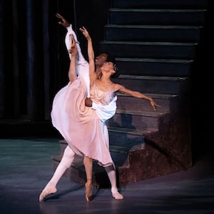 Misty Copeland, right, and Calvin Royal III perform in a duet from "Romeo and Juliet" at Copeland's retirement performance from American Ballet Theatre at the David H. Koch Theater at Lincoln Center on Wednesday, Oct. 22, 2025, in New York. (Rosalie O'Connor via AP)