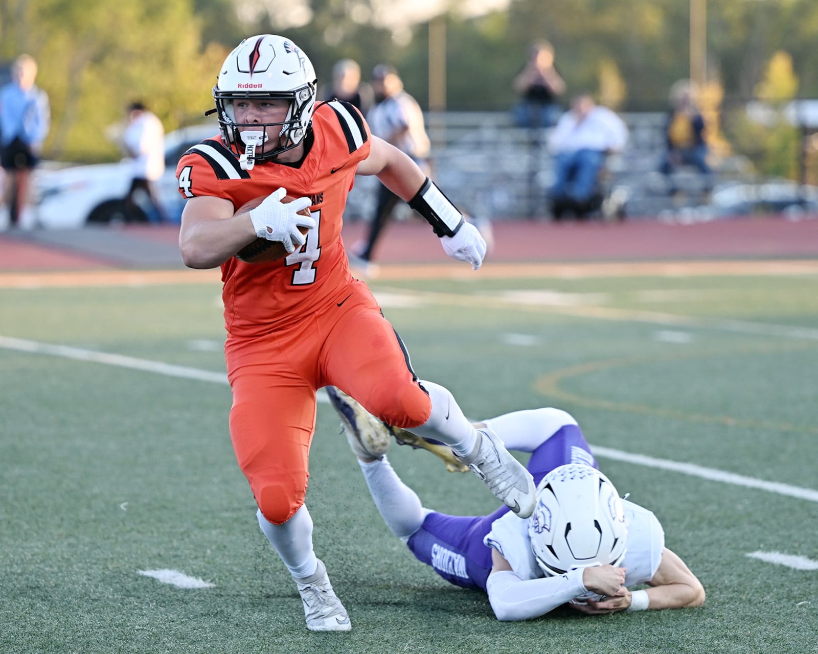 Waynesville High School sophomore Gregory Marlow slips past a Dayton Christian defending during their game on Friday, Sept. 26 at Spartan Stadium. The Spartans won 52-35. NICK FALZERANO / CONTRIBUTED PHOTO