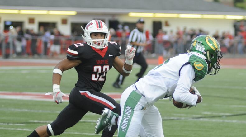 Wayne’s Jaden Hurd (left) chases Jazz Keys of Northmont. Wayne defeated visiting Northmont 49-20 in a Week 5 high school football game on Friday, Sept. 21, 2018. MARC PENDLETON / STAFF