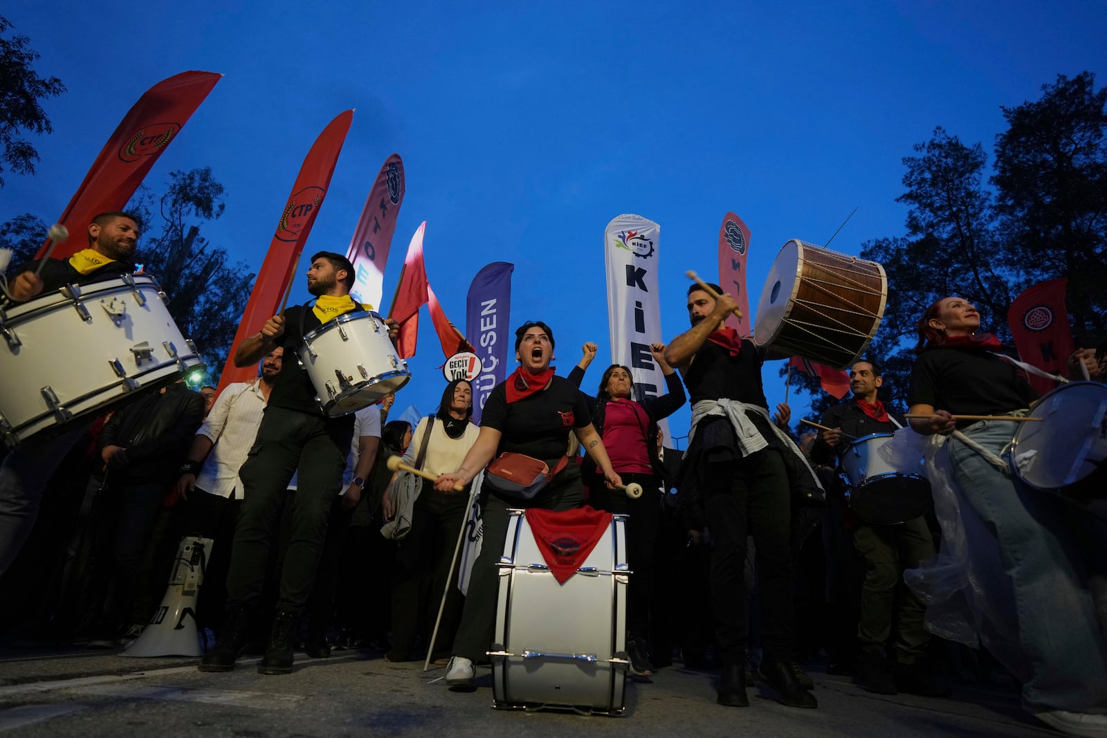 Several thousand Turkish Cypriots took to the streets of the northern half of ethnically divided Cyprus' capital Nicosia to protest what they say is Turkey's attempt to erode their secular roots and to strengthen the hold of political Islam over their society, on Friday, May 2, 2025. (AP Photo/Petros Karadjias)