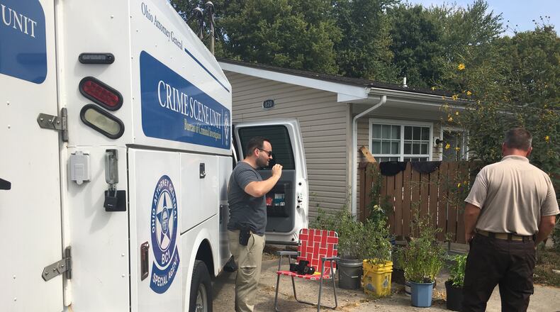 The Ohio Bureau of Criminal Investigation conducted a search of an apartment on Hunter Road in Enon as part of the unsolved homicide of Leonid Clark. Greene County Capt. Sean Magoteaux said the residents of that apartment are not considered suspects in the case. RICHARD WILSON/STAFF