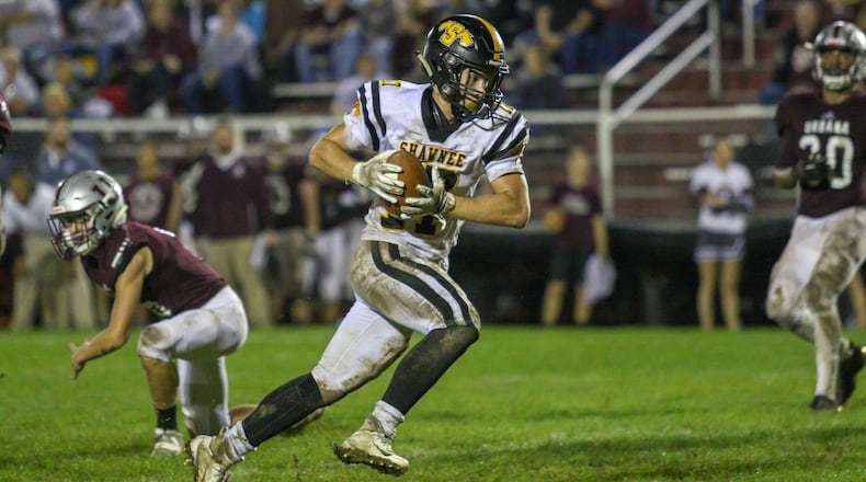 Shawnee wide receiver Pete Mueller runs the ball into the end zone during the Braves game at Urbana on Friday night. Urbana won 47-12. Michael Cooper/CONTRIBUTED