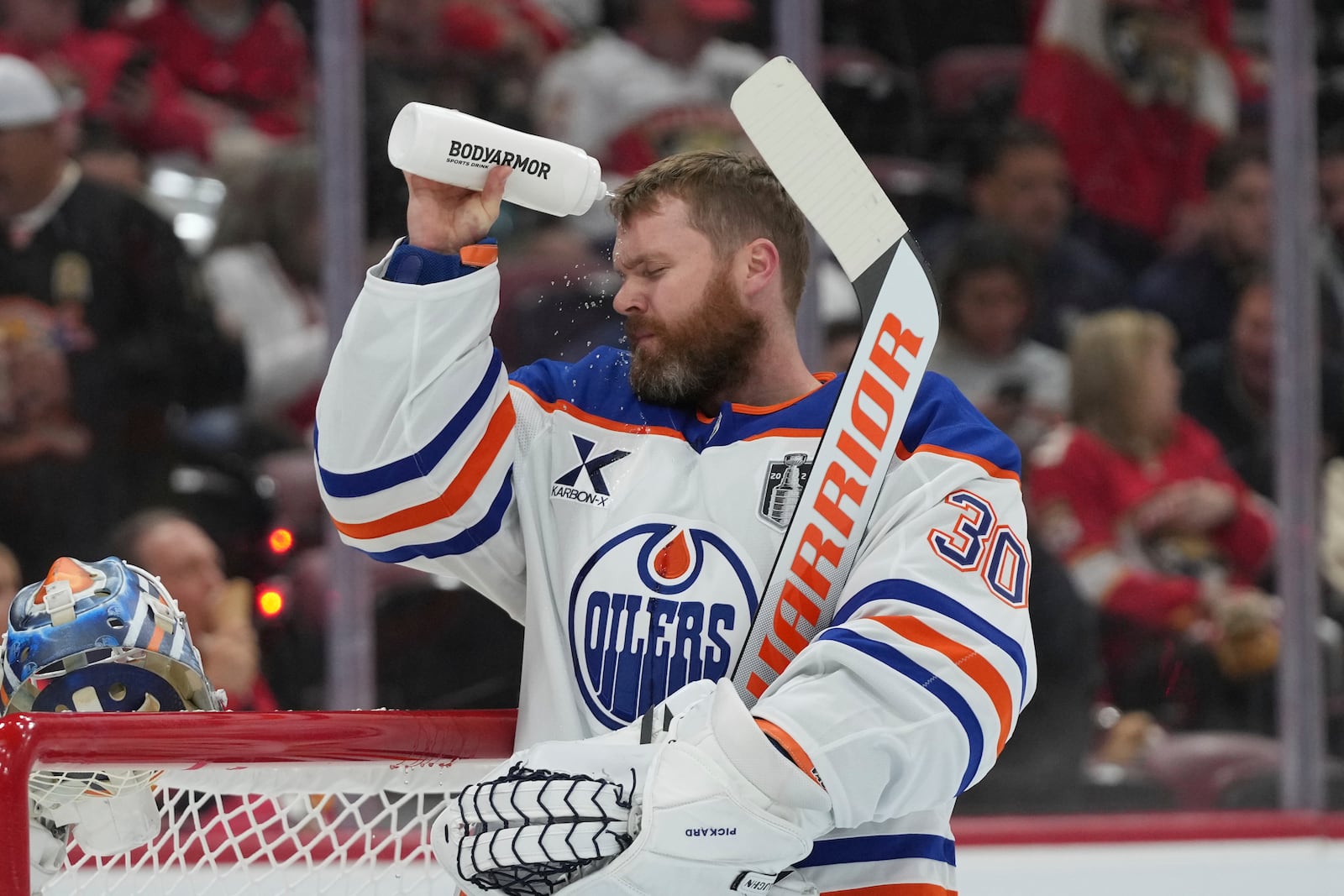 Edmonton Oilers goaltender Calvin Pickard (30) takes a break during the second period of Game 4 of the NHL hockey Stanley Cup Final against the Florida Panthers.Thursday, June 12, 2025, in Sunrise, Fla. (AP Photo/Lynne Sladky)