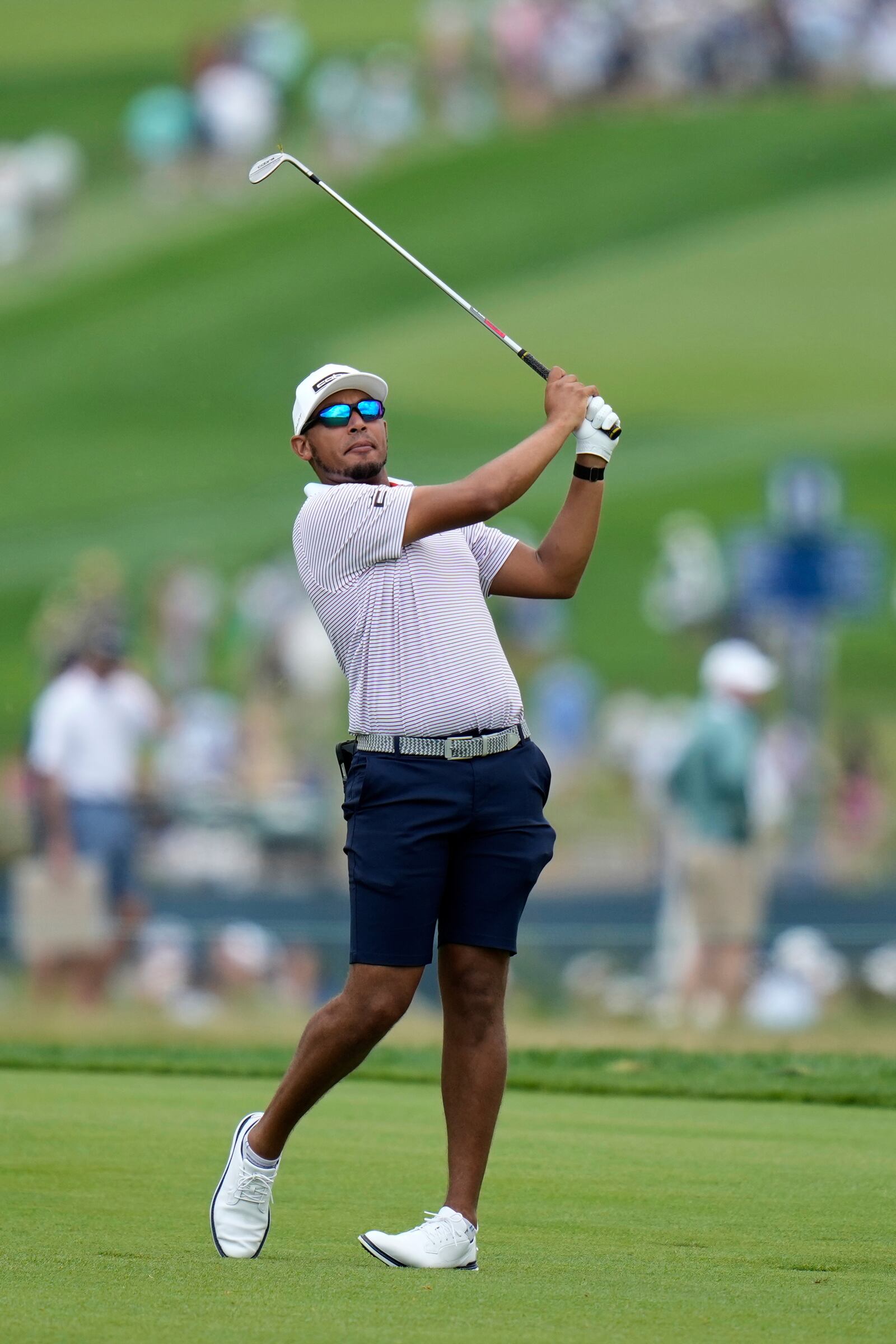 Chase Johnson hits from the fifth fairway during a practice round ahead of the U.S. Open golf tournament at Oakmont Country Club Tuesday, June 10, 2025, in Oakmont, Pa. (AP Photo/Seth Wenig)