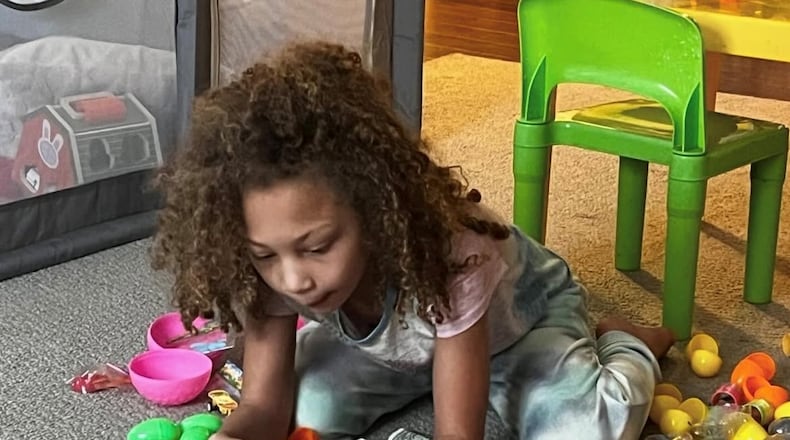 Pamela’s daughter Jasmine organizing her egg haul on Easter morning. CONTRIBUTED