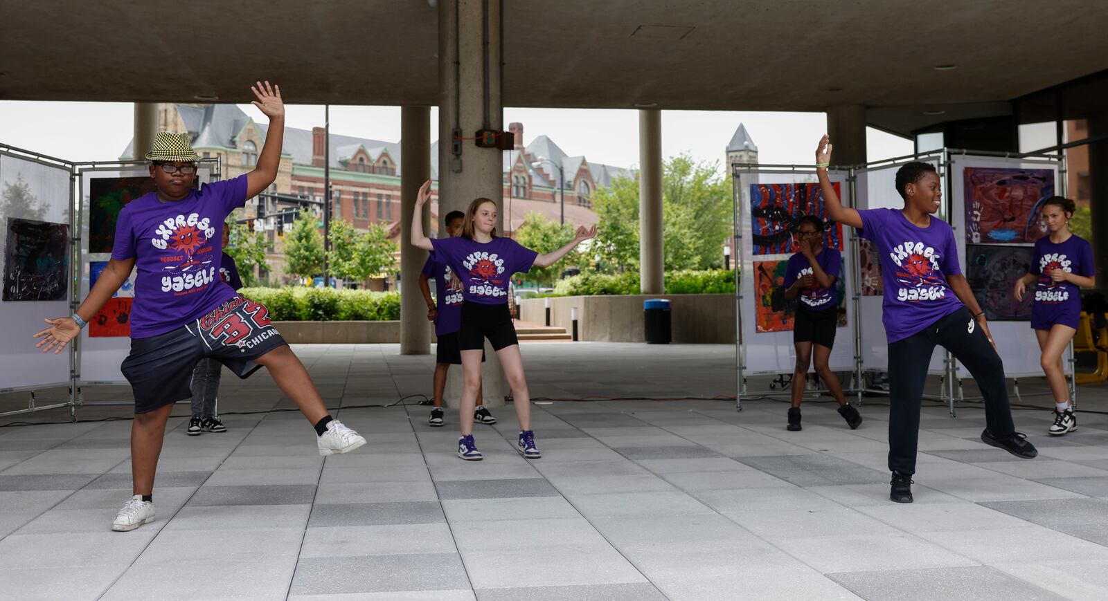 Kids dance as part of a performance with Project Jericho Summer Arts Camp on Friday, June 13, 2025, at Springfield City Plaza. JOSEPH COOKE/STAFF
