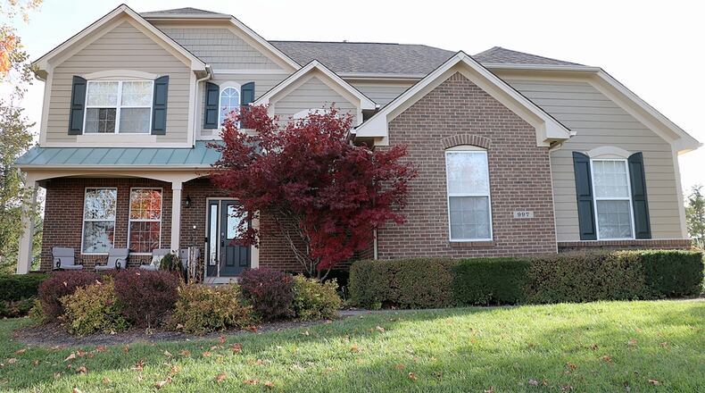 Listed for $535,000 BY Sibcy Cline Realtors, the brick-and-frame house at 997 Sweeney Drive in Washington Twp. has about 3,268 square feet of living space. Situated diagonally on a corner lot, the house is conveniently located near many of the Washington Trace neighborhood amenities including tennis and pickle ball courts, basketball court, club house, swimming pool, exercise room, playground and walking paths. CONTRIBUTED