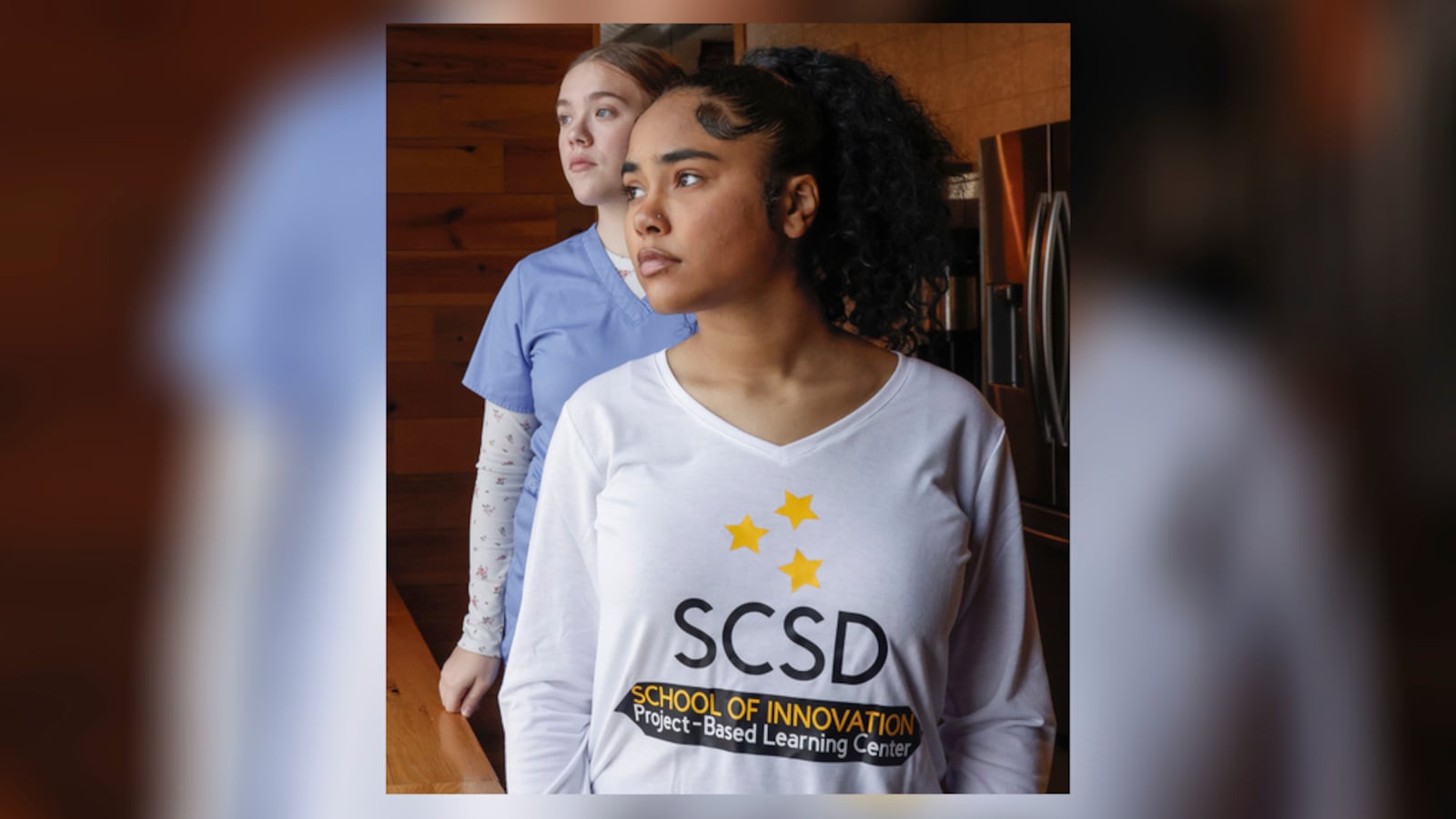 Omaria Ali, front, and Hannah Mills, juniors at the School of Innovation (SOI), pose for a portrait on Wednesday, December 3, 2025, at COhatch Springfield. Both students expressed frustration that the school is closing in 2026. JOSEPH COOKE/STAFF