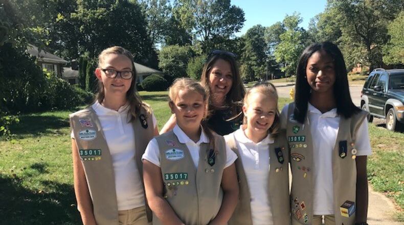 Shannon Meadows and some of her girls from Girl Scout Troop #35017 before the coronavirus pandemic which has put in-person meetings on hold. SUBMITTED PHOTO