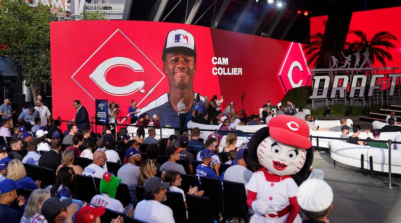 Cam Collier is selected by the Cincinnati Reds with the 18th pick of the 2022 MLB baseball draft, Sunday, July 17, 2022, in Los Angeles. (AP Photo/Jae C. Hong)