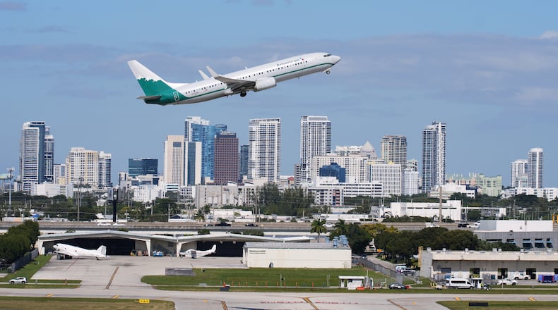FILE - An American Airlines aircraft takes off from Fort Lauderdale-Hollywood International Airport, Thursday, Nov. 13, 2025, in Fort Lauderdale, Fla. (AP Photo/Lynne Sladky,File)