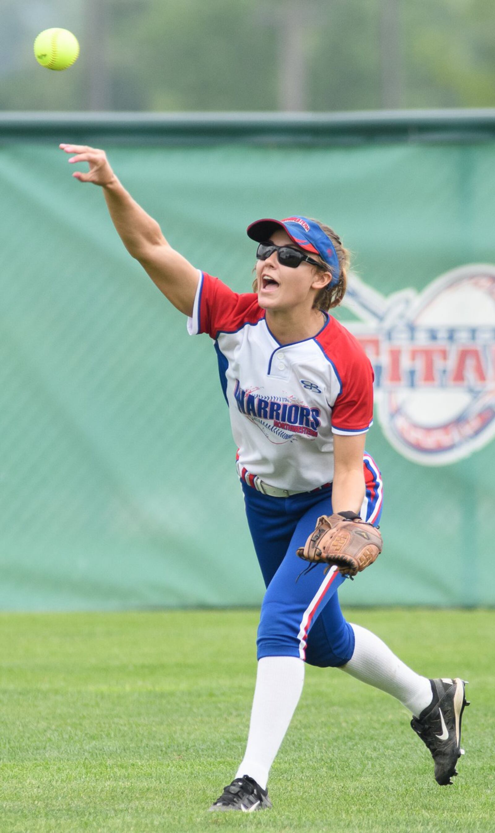 Northwestern senior center fielder Rachel Martin throws in the first inning of a Division III regional semifinal against Columbus Bishop Ready on Saturday at Wright State. Contributed Photo by Bryant Billing