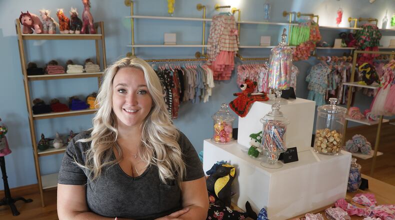 Tiffany Ballew, in her new boutique called HullaBallew in New Carlisle, Monday, Sept. 12, 2022. HullaBallew has its grand opening Saturday. BILL LACKEY/STAFF