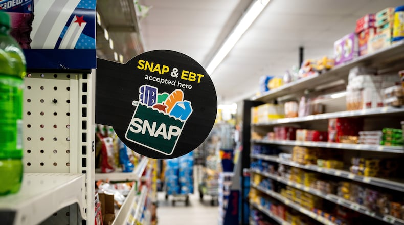 A sign for SNAP at a Dollar General store in Lexington, S.C., Aug. 10, 2021. About 42 million low-income Americans are set to lose access to monthly nutrition assistance in November, after the Trump administration said on Friday, Oct. 24, 2025, that it would not reconfigure the budget to provide benefits during the government shutdown. (Erin Schaff/The New York Times)