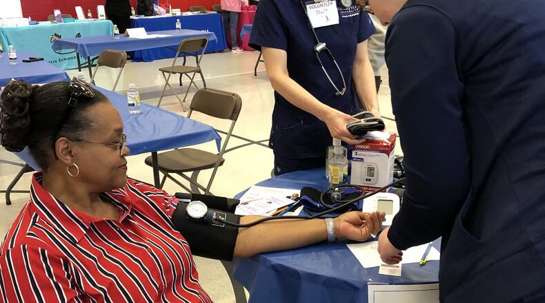 Blood pressure was one of several health conditions attendees of the NAACP Minority Health Fair could checked out. BRETT TURNER / CONTRIBUTED