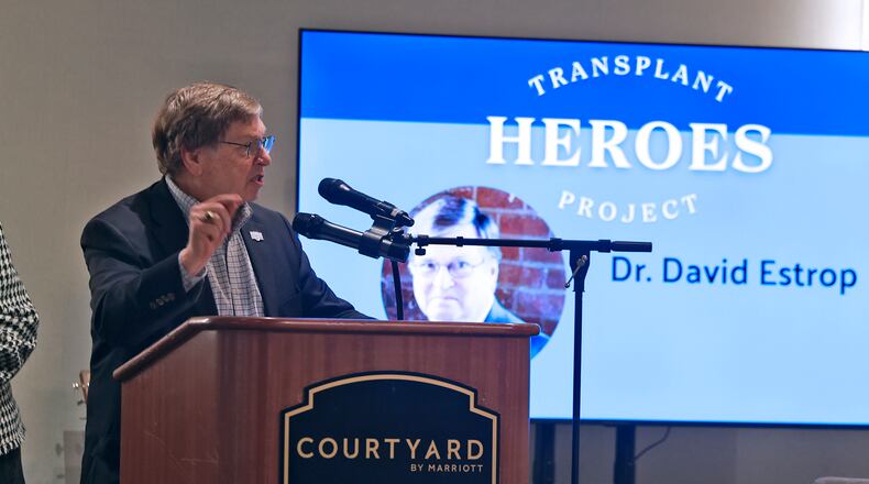 Dr. David Estrop speaks during the Mayor's Breakfast after being honored as a Transplant Hero Thursday, Nov. 21, 2024. BILL LACKEY/STAFF