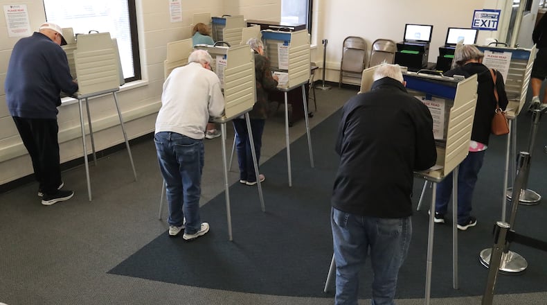 The Clark County Board of Elections was busy Wednesday, Oct. 12, 2022 as voters came out for the first day of early voting. BILL LACKEY/STAFF