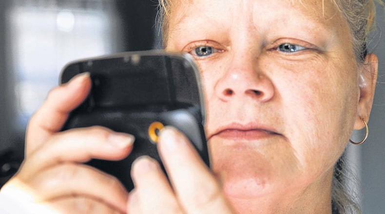 Renee Knapke of Centerville receives two or three spam text messages a week.