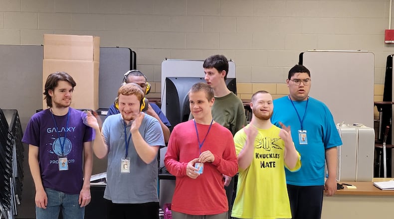 The Abilities Connection (TAC) in Springfield successfully completed its first academic year of the Bridging Abilities program, which allows students to work in the classroom as they finish high school. Here is from a celebration the students had when they received their first paycheck last year. Contributed