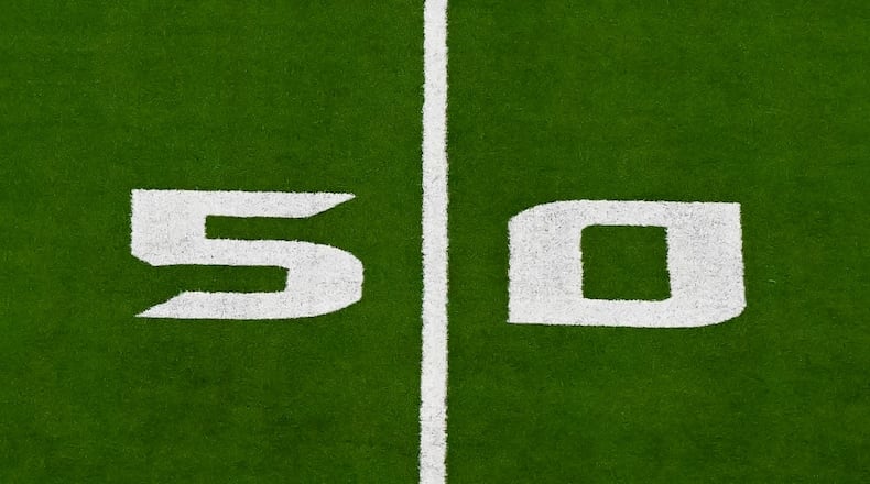 FILE - A detail view of the 50 yard line prior to an NFL football game between the Detroit Lions and the Houston Texans, Sunday, Nov 10, 2024 in Houston. (AP Photo/Maria Lysaker, File)