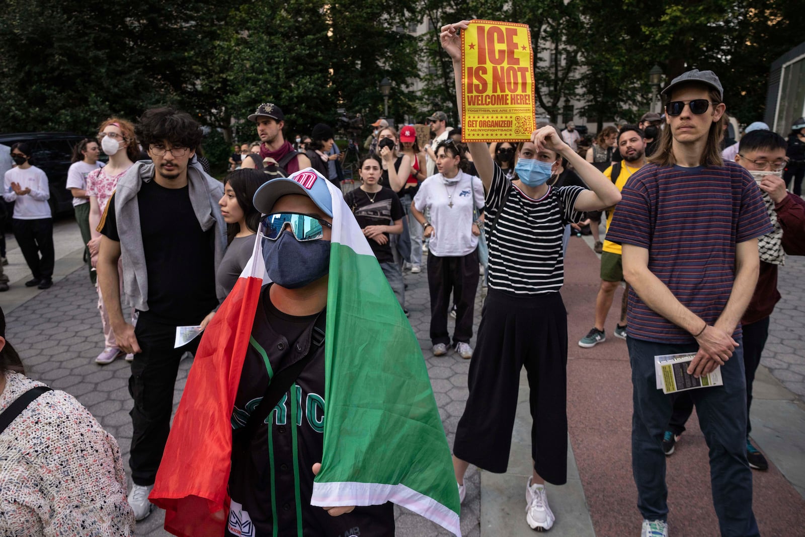 A demonstrator with carrying a Mexican flag chants during a protest against deportation by Immigration and Customs Enforcement in New York, Wednesday, June 11, 2025. (AP Photo/Yuki Iwamura)