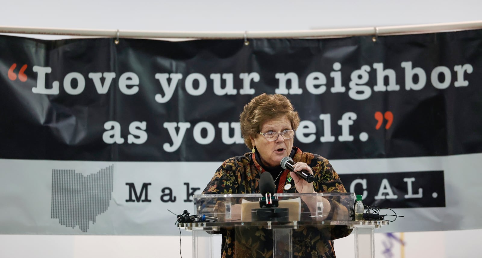 Casey Rollins, executive director of St. Vincent de Paul, speaks at a press conference held by Springfield Neighbors United, in partnership with ABLE and G92, at Greater Grace Temple on Monday, March 16, 2026, in Springfield. The press conference was held to ask for support of an amicus brief filed with the U.S. Supreme Court that called for the continuation of Temporary Protected Status for Haitians in Springfield. JOSEPH COOKE/STAFF