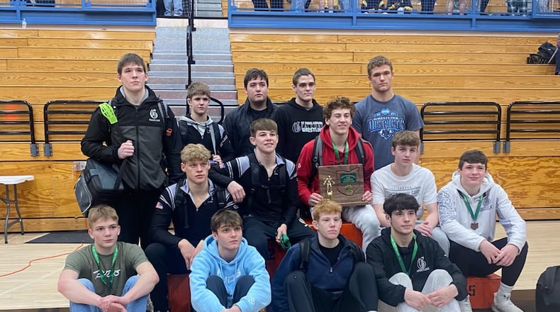 The Graham High School wrestling team, pictured after winning the Division II district title, is seeking its 24th state team championship this weekend in Columbus. CONTRIBUTED