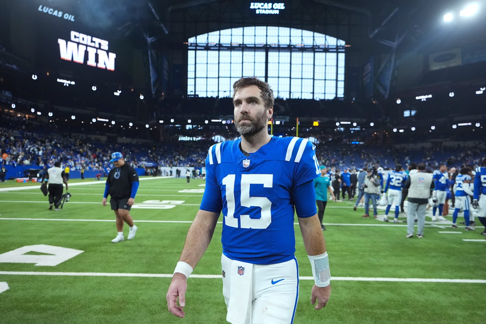 FILE - Indianapolis Colts quarterback Joe Flacco walks from the field after an NFL football game against the Jacksonville Jaguars, Sunday, Jan. 5, 2025, in Indianapolis. (AP Photo/Michael Conroy, File)